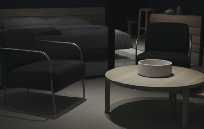 A dark-themed furniture setup